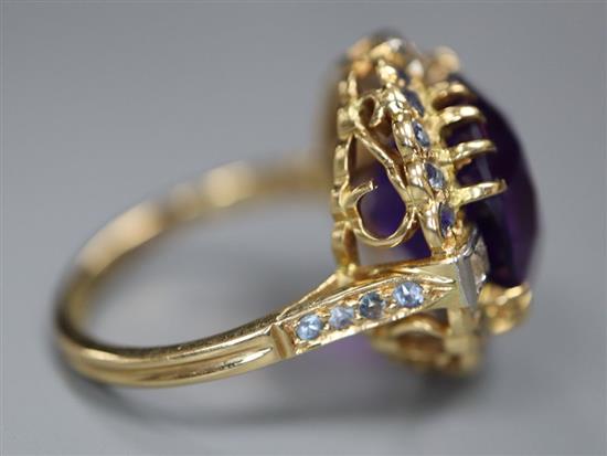 An 18ct yellow gold, amethyst, sapphire and diamond dress ring, with claw-set basket mount, size N, gross 7.5g